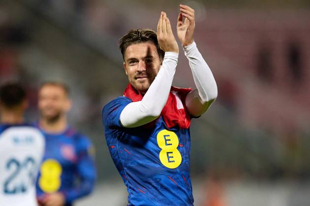 TA™ QALI, MALTA - JUNE 16: England national soccer team player Jack Grealish salutes the England fans (not in picture) after the UEFA EURO, EM, Europameisterschaft,Fussball 2024 European qualifying soccer match between Malta and England at the National Stadium, Ta™ Qali, Malta, on 16 June 2023. Malta v England - UEFA EURO 2024 European Qualifier