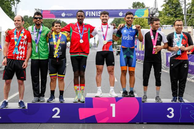 Special Olympics World Games In Berlin 2023 - Day 5 Cycling athletes receive their medals after participating in a 5 kilometer race during the Special Olympics Summer World Games Berlin 2023 in front of the Brandenburg Gate on BundesStrasse in the center of Berlin, Germany on June 21, 2023. The 2023 Berlin Games hosts 7000 athletes with learning disabilities from nearly 190 countries. Special Olympics is an international charity which aims to include individuals with learning disabilities into the realm of olympic sports. Berlin 2023 is the biggest sporting as well as charitable event of 2023. Berlin Berlin Germany  Copyright: xDominikaxZarzyckax originalFilename:zarzycka-specialo230621_npL0Z.jpg