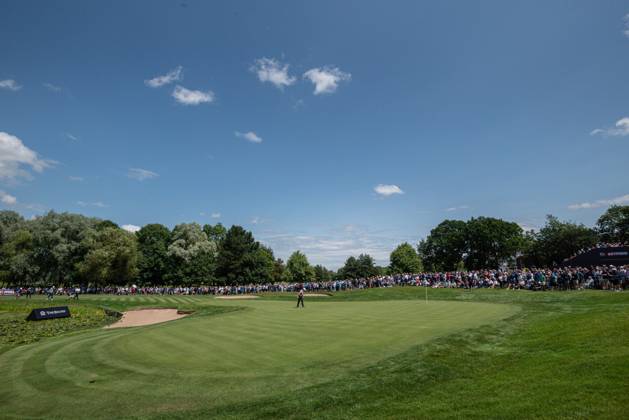 29th June 2023; The Belfry, Sutton Coldfield, West Midlands, England: Betfred British Masters Golf, Day 1; Justin Rose (ENG) on the 9th green (his last hole) with by far the largest crowd of the day  ActionPlus12524911 GodfreyxPitt