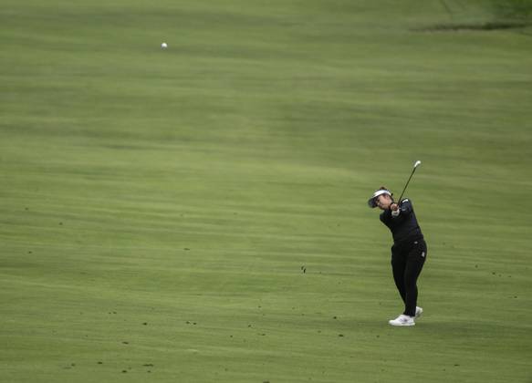 Hyo Joo Kim of Korea hits her approach shot on the 14th hole in round one of the Women s U.S. Open at Pebble Beach, California on Thursday, July 6, 2023.  PBP2023070626 TERRYxSCHMITT