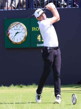 American Keegan Bradley tees off on the 1st hole on the first day at the 151st Open Championship at Royal Liverpool Golf Club in Hoylake, England on Thursday, July 20, 2023.  LON2023072066 HUGOxPHILPOTT