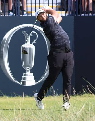 Spain s Jon Rahm s drives on the 1st tee on the first day at the 151st Open Championship at Royal Liverpool Golf Club in Hoylake, England on Thursday, July 20, 2023.  LON20230720884 HUGOxPHILPOTT