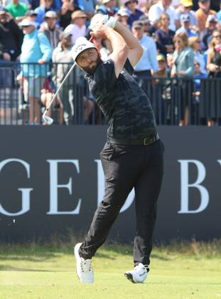Spain s Jon Rahm drives on the fourth tee on the first day at the 151st Open Championship at Royal Liverpool Golf Club in Hoylake, England on Thursday, July 20, 2023.  LON20230720115 HUGOxPHILPOTT