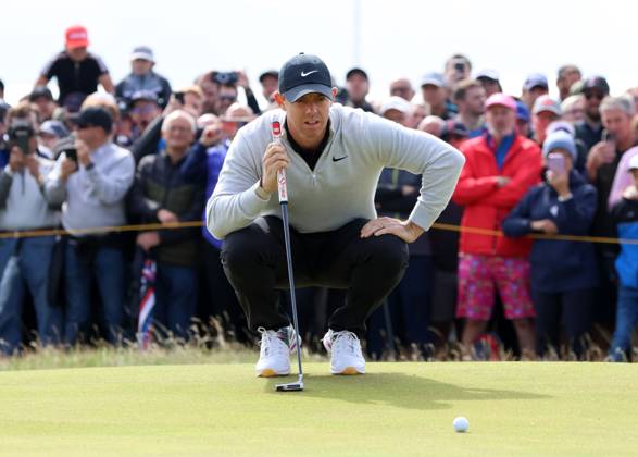 Northern Ireland s Rory Mcllroy lines up a putt on the first green on the second day at the 151st Open Championship at Royal Liverpool Golf Club in Hoylake, England on Friday, July 21, 2023. Harman is currently leading the Open on ten under par.  LON2023072133 HUGOxPHILPOTT
