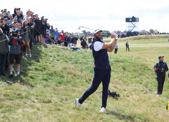 American Dustin Johnson hits it out of the rough on the twelfth hole on the second day at the 151st Open Championship at Royal Liverpool Golf Club in Hoylake, England on Friday, July 21, 2023. Harman is currently leading the Open on ten under par.  LON2023072106 HUGOxPHILPOTT