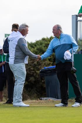 29th July 2023; Royal Porthcawl, Porthcawl, Bridgend, Wales: Senior Open Championship, Round 3; Northern Ireland& x2019;s Darren CLARKE (L) shakes hands with his countryman Damian MOONEY before the first tee off.  ActionPlus12536823 DanxMinto