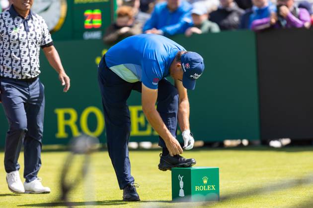 29th July 2023; Royal Porthcawl, Porthcawl, Bridgend, Wales: Senior Open Championship, Round 3; Ireland& x2019;s Padraig HARRINGTON ties his laces at the first tee.  ActionPlus12537107 DanxMinto