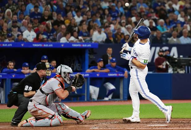 August 2, 2023, TORONTO, ON, CANADA: Toronto Blue Jays Matt Chapman (26) is hit by a pitch as Baltimore Orioles catcher James McCann (27) looks on during sixth inning American League MLB, Baseball Herren, USA baseball action in Toronto on Wednesday, August 2, 2023. Canada News - August 2, 2023 - ZUMAc35_ 20230802_zaf_c35_059 Copyright: xNathanxDenettex