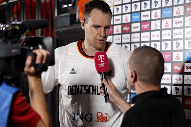 13 08 2023, German Basketball Federation, Supercup 2023, Hamburg, edel optics de Arena, final, Germany Canada, Johannes Voigtmann GER, No7 interviewed by Benni Zander, Magenta Sport Hamburg edel optics de Arena Hamburg Germany