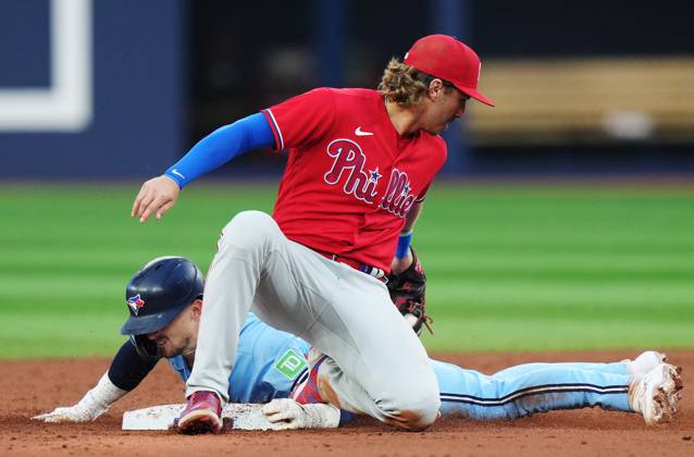 August 16, 2023, TORONTO, ON, CANADA: Toronto Blue Jays Cavan Biggio (left) steals second base ahead of the tag from Philadelphia Phillies second baseman Bryson Stott (5) during second inning MLB, Baseball Herren, USA interleague baseball action in Toronto on Wednesday, August 16, 2023. Canada News - August 16, 2023 - ZUMAc35_ 20230816_zaf_c35_095 Copyright: xNathanxDenettex