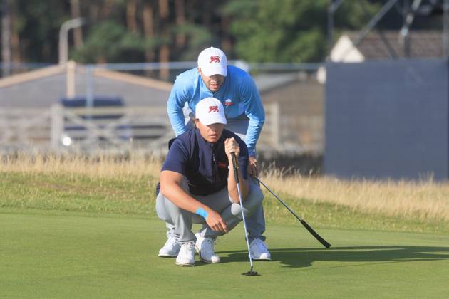 2nd September 2023; Old Course at St Andrews, St Andrews, Fife, Scotland; Walker Cup, Great Britain and Ireland versus USA, First Round; Alex Maguire and James Ashfield of Great Britain and Ireland line up a putt on the first green on the Old Course, St Andrews, during their foursomes match  ActionPlus12549254 DavidxYoung