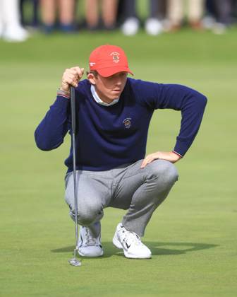 3rd September 2023; Old Course at St Andrews, St Andrews, Fife, Scotland; Walker Cup, Final Round; Gordon Sargent of the United States of America line sup a putt for the match on the 18th green on the Old Course, St Andrews, during a foursomes match  ActionPlus12550404 DavidxYoung