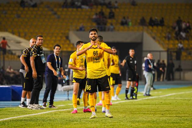 Iraq s Al-Quwa Al-Jawiya (Air Force)?? Iran s Sepahan - AFC Champions League in Erbil, Iraq - 18 Sep 2023 Sepahan s player 66 Mohammad Ghorbani celebrate after scoring a goal during the first round of the AFC Champions League group stage matches between Iraq s Al-Quwa Al-Jawiya (Air Force) and Iran s Sepahan in Franso Hariri stadium in Erbil city, the capital of Iraq s northern autonomous Kurdistan region. Final score 2-2 Erbil Iraq Copyright: xIsmaelxAdnanx xSOPAxImagesx aÌ?Â?ÂIADNAN_01223