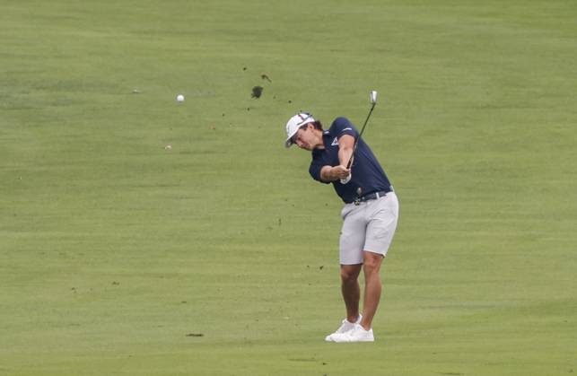 James Piot of the US hits his approach shot on the fourteenth hole during the first round of the 2023 LIV Golf League tournament at Rich Harvest Farms in Sugar Grove, Illinois, on Friday September 22, 2023. Tournament play runs from September 22nd through the 24th.  SGI20230922803 TANNENxMAURY