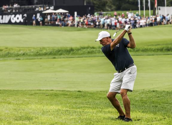 Phil Mickelson of the US hits from the rough on the eighteenth hole during the first round of the 2023 LIV Golf League tournament at Rich Harvest Farms in Sugar Grove, Illinois, on Friday September 22, 2023. Tournament play runs from September 22nd through the 24th.  SGI20230922849 TANNENxMAURY