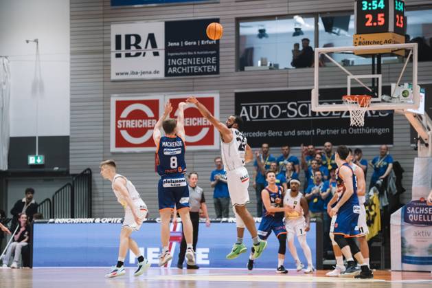 BARMER 2 Basketsball Bundesliga ProA season 2023 2024 3 matchday on 15 10 23 Medipolis SC Jena vs Phoenix Hagen v li Brock Mackenzie Hagen with the throw against Rasheed Moore Jena Sparkassen Arena Jena
