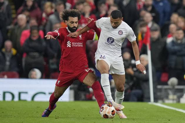 UEFA Europa League Liverpool v Toulouse Mohamed Salah 11 of Liverpool competes for the ball with Yanis Begraoui 14 of Toulouse during the UEFA Europa League match Liverpool vs Toulouse at Anfield, Liverpool, United Kingdom, 26th October 2023 (Photo by Steve Flynn News Images) Liverpool Anfield Merseyside United Kingdom Copyright: xStevexFlynn NewsxImagesx
