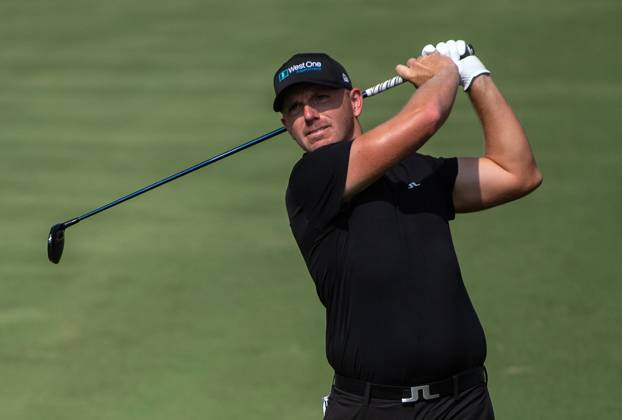 MATT WALLACE of England strikes the ball on the second fairway during DP World Tour Championship in Dubai, United Arab Emirates, Nov 19, 2023. Dubai United Arab Emirates  Copyright: xMARTINxDOKOUPILx 443_1584