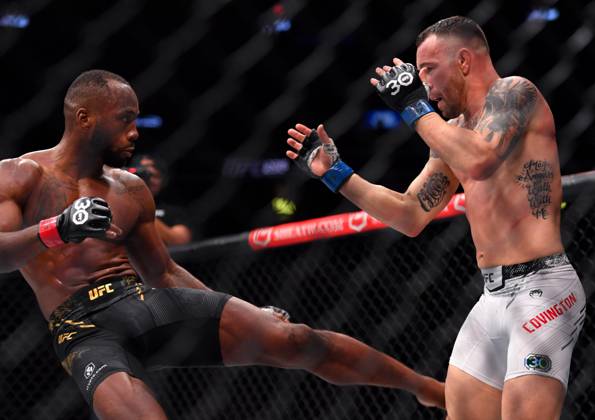 December 16, 2023, Las Vegas, Nevada, USA: LEON EDWARDS (21-3-0) of Erdington, birmingham, England (L) defeats COLBY COVINGTON (17-3-0) of Miami, Florida USA (R) by a unanimous decision (49-46, 49-46, 49-46) during UFC 296 at T-Mobile Arena, Las Vegas Las Vegas USA - ZUMAo117 20231216_zsp_o117_040 Copyright: xMikaelxOnax