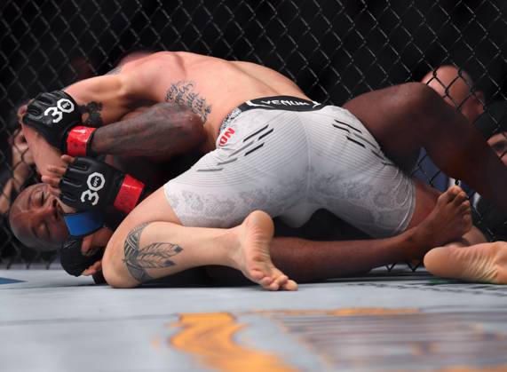 December 16, 2023, Las Vegas, Nevada, USA: LEON EDWARDS (21-3-0) of Erdington, birmingham, England defeats COLBY COVINGTON (17-3-0) of Miami, Florida USA by a unanimous decision (49-46, 49-46, 49-46) during UFC 296 at T-Mobile Arena, Las Vegas Las Vegas USA - ZUMAo117 20231216_zsp_o117_043 Copyright: xMikaelxOnax