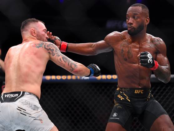 December 16, 2023, Las Vegas, Nevada, USA: LEON EDWARDS (21-3-0) of Erdington, birmingham, England (R) defeats COLBY COVINGTON (17-3-0) of Miami, Florida USA (L) by a unanimous decision (49-46, 49-46, 49-46) during UFC 296 at T-Mobile Arena, Las Vegas Las Vegas USA - ZUMAo117 20231216_zsp_o117_048 Copyright: xMikaelxOnax