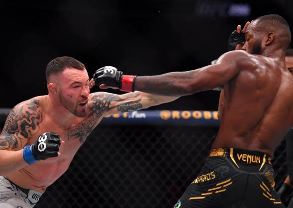 December 16, 2023, Las Vegas, Nevada, USA: LEON EDWARDS (21-3-0) of Erdington, birmingham, England (R) defeats COLBY COVINGTON (17-3-0) of Miami, Florida USA (L) by a unanimous decision (49-46, 49-46, 49-46) during UFC 296 at T-Mobile Arena, Las Vegas Las Vegas USA - ZUMAo117 20231216_zsp_o117_049 Copyright: xMikaelxOnax