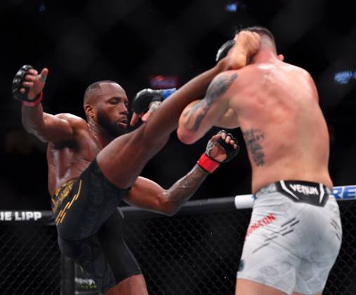 December 16, 2023, Las Vegas, Nevada, USA: LEON EDWARDS (21-3-0) of Erdington, birmingham, England (L) defeats COLBY COVINGTON (17-3-0) of Miami, Florida USA (R) by a unanimous decision (49-46, 49-46, 49-46) during UFC 296 at T-Mobile Arena, Las Vegas Las Vegas USA - ZUMAo117 20231216_zsp_o117_051 Copyright: xMikaelxOnax