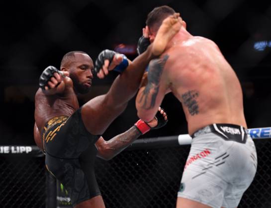 December 16, 2023, Las Vegas, Nevada, USA: LEON EDWARDS (21-3-0) of Erdington, birmingham, England (L) defeats COLBY COVINGTON (17-3-0) of Miami, Florida USA (R) by a unanimous decision (49-46, 49-46, 49-46) during UFC 296 at T-Mobile Arena, Las Vegas Las Vegas USA - ZUMAo117 20231216_zsp_o117_053 Copyright: xMikaelxOnax