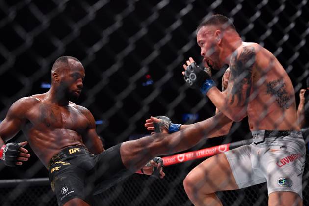 December 16, 2023, Las Vegas, Nevada, USA: LEON EDWARDS (21-3-0) of Erdington, birmingham, England (L) defeats COLBY COVINGTON (17-3-0) of Miami, Florida USA (R) by a unanimous decision (49-46, 49-46, 49-46) during UFC 296 at T-Mobile Arena, Las Vegas Las Vegas USA - ZUMAo117 20231216_zsp_o117_054 Copyright: xMikaelxOnax