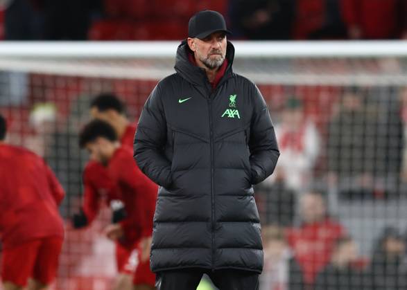 Liverpool, England, 23rd December 2023. Jurgen Klopp manager of Liverpool watches the opposition warm up during the Premier League match at Anfield, Liverpool. Picture credit should read: Darren Staples Sportimage EDITORIAL USE ONLY. No use with unauthorised audio, video, data, fixture lists, club league logos or live services. Online in-match use limited to 120 images, no video emulation. No use in betting, games or single club league player publications. SPI-2829-0011