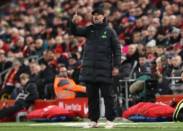Liverpool, England, 23rd December 2023. Jurgen Klopp manager of Liverpool signals his players during the Premier League match at Anfield, Liverpool. Picture credit should read: Darren Staples Sportimage EDITORIAL USE ONLY. No use with unauthorised audio, video, data, fixture lists, club league logos or live services. Online in-match use limited to 120 images, no video emulation. No use in betting, games or single club league player publications. SPI-2829-0064