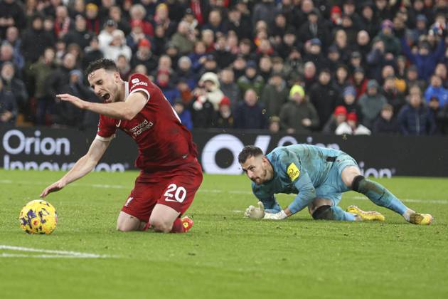 Football - 2023 2024 Premier League - Liverpool vs Newcastle United - Anfield - Monday 1st January 2024. Diogo Jota of Liverpool is fouled by Martin Dubravka of Newcastle United for a penalty