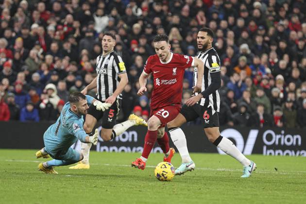 Football - 2023 2024 Premier League - Liverpool vs Newcastle United - Anfield - Monday 1st January 2024. Diogo Jota of Liverpool is fouled by Martin Dubravka of Newcastle United for a penalty