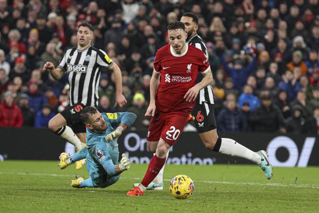 Football - 2023 2024 Premier League - Liverpool vs Newcastle United - Anfield - Monday 1st January 2024. Diogo Jota of Liverpool is brought down by Martin Dubravka of Newcastle United for a penalty