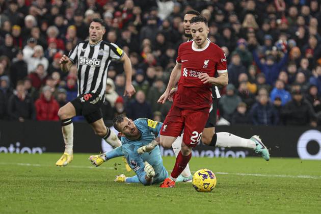 Football - 2023 2024 Premier League - Liverpool vs Newcastle United - Anfield - Monday 1st January 2024. Diogo Jota of Liverpool is brought down by Martin Dubravka of Newcastle United for a penalty