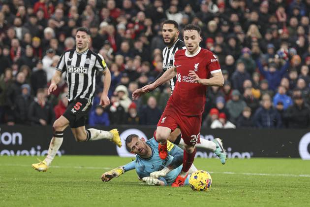 Football - 2023 2024 Premier League - Liverpool vs Newcastle United - Anfield - Monday 1st January 2024. Diogo Jota of Liverpool is fouled by Martin Dubravka of Newcastle United for a penalty