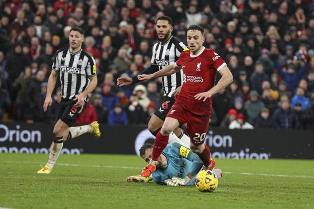 Football - 2023 2024 Premier League - Liverpool vs Newcastle United - Anfield - Monday 1st January 2024. Diogo Jota of Liverpool is brought down by Martin Dubravka of Newcastle United for a penalty