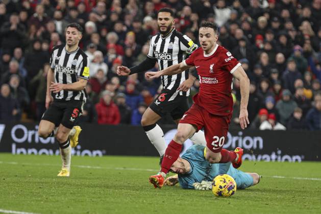 Football - 2023 2024 Premier League - Liverpool vs Newcastle United - Anfield - Monday 1st January 2024. Diogo Jota of Liverpool is brought down by Martin Dubravka of Newcastle United for a penalty