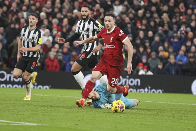 Football - 2023 2024 Premier League - Liverpool vs Newcastle United - Anfield - Monday 1st January 2024. Diogo Jota of Liverpool is fouled by Martin Dubravka of Newcastle United for a penalty