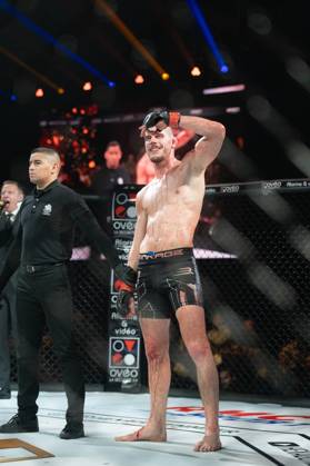 Theo ULRICH (black trunk) won his fight against Remi BOURGEOIS (blue trunk) during the Hexagone MMA 13 by TKO paris zenith france Copyright: xJULIEN_BRONDANIx JBR_0588