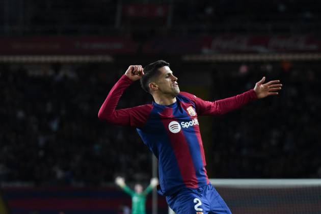 February 11, 2024, Girona, Barcelona, Spain, Spain: Joao Cancelo of FC Barcelona, Barca celebrates after his team scoring a goal during the match between FC Barcelona and Granada as part of La Liga at LluoÂs Companys Olympic Stadium on February 11, 2024 in Girona, Spain. ( o³ PxImages) Girona Spain - ZUMAp175 20240211_zsa_p175_022 Copyright: xSaraxAribx