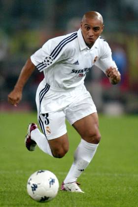 Onderwerp Subject: Real Madrid Champions League Club Team Country: Real Madrid Seizoen Season: 2002 2003 FOTO PHOTO: Real Madrid s ROBERTO CARLOS ROME ITA Content not available for redistribution in The Netherlands directly or indirectly through any third parties. Copyright: xBSRxAgencyx 02190917362C6187
