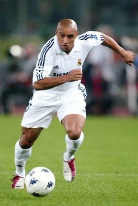 Onderwerp Subject: Real Madrid (0-3) Champions League Club Team Country: Real Madrid Seizoen Season: 2002 2003 FOTO PHOTO: Real Madrid s ROBERTO CARLOS ROME ITA Content not available for redistribution in The Netherlands directly or indirectly through any third parties. Copyright: xBSRxAgencyx 02190917362C6186