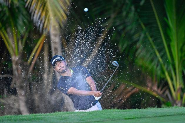 RIO GRANDE, PR - MARCH 07: Satoshi Kodaira (JPN) hits from the trap on 11 during Rd1 of the Puerto Rico Open at Grand Reserve Country Club (Old) on March 7, 2024, in Rio Grande, Puerto Rico. (Photo by Ken Murray Icon Sportswire) GOLF: MAR 07 PGA, Golf Herren Puerto Rico Open EDITORIAL USE ONLY Icon240307006