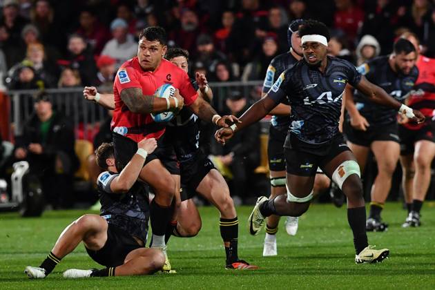 Super Rugby Pacific Round Four- Crusaders And Hurricanes Levi Aumua of the Crusaders (2nd L) is being tackled by the Hurricanes defense during the round four Super Rugby Pacific match between the Crusaders and the Hurricanes at Apollo Projects Stadium in Christchurch, New Zealand, on March 15, 2024. Christchurch New Zealand  Copyright: xSankaxVidanagamax originalFilename:vidanagama-notitle240315_np3qP.jpg