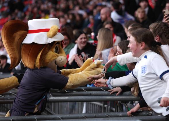 London, England, 5th April 2024. The England team mascots give high fives to fans during the UEFA Women s European Qualifier match at Wembley Stadium, London. Picture: Paul Terry Sportimage EDITORIAL USE ONLY. No use with unauthorised audio, video, data, fixture lists, club league logos or live services. Online in-match use limited to 120 images, no video emulation. No use in betting, games or single club league player publications. SPI-3058-0042
