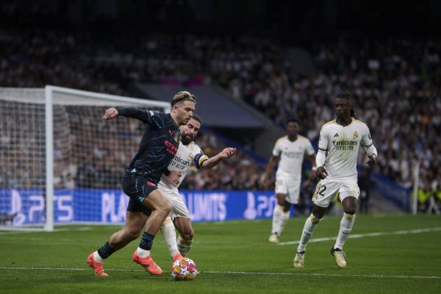 2024-04-09 Real Madrid CF v Manchester City - Quarter-final First Leg - UEFA Champions League 2023 24 MADRID, SPAIN - APRIL 9: Dani Caravajal of Real Madrid CF competes for the ball with Jack Grealish of Manchester City during the Quarter-final First Leg - UEFA Champions League match between Real Madrid CF and Manchester City at Estadio Santiago Bernabeu on April 9, 2024 in Madrid, Spain. (Photo by Pablo Morano BSR Agency) Madrid Spain Content not available for redistribution in The Netherlands directly or indirectly through any third parties. Copyright: xBSRxAgencyx