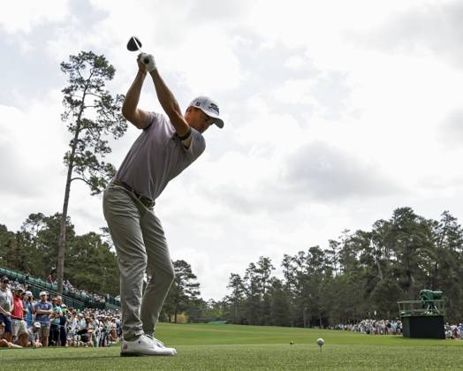 Justin Thomas of the US hits a tee shot on the fourteenth hole during a practice round at the Masters Tournament at Augusta National Golf Club in Augusta, Georgia on Wednesday, April 10, 2024.  AUG20240410545 TANNENxMAURY