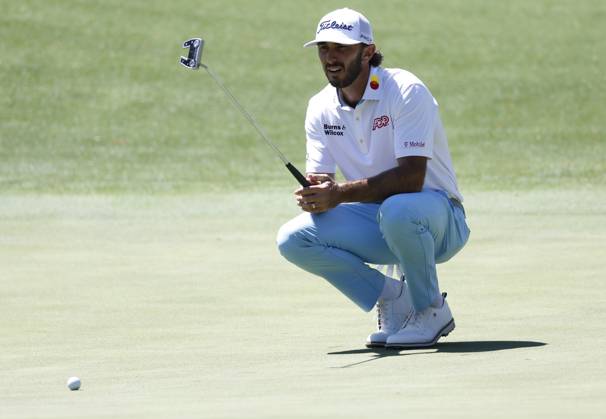 Max Homa lines up a putt on the eighth hole in the second round of the Masters Tournament at Augusta National Golf Club in Augusta, Georgia on Friday, April 12, 2024.  AUG20240412104 JOHNxANGELILLO