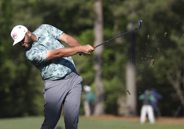 Spain s Jon Rahm tees off on the twelfth hole during the second round of the Masters Tournament at Augusta National Golf Club in Augusta, Georgia on Friday, April 12, 2024.  AUG20240412593 TANNENxMAURY